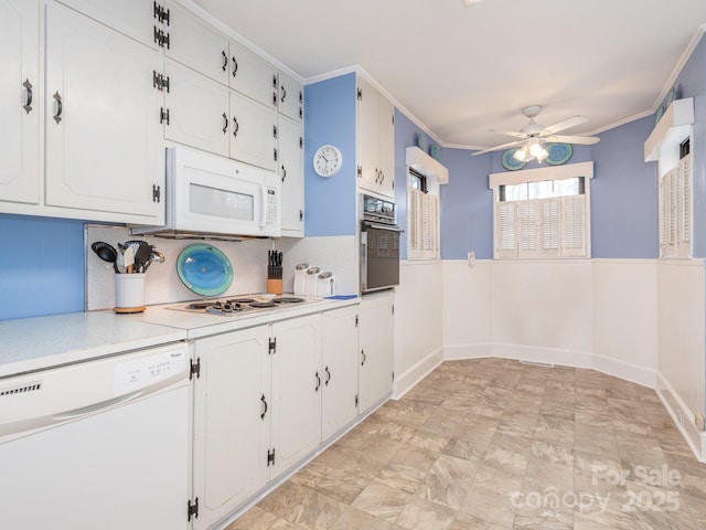 kitchen with white cabinets, white appliances, ceiling fan, and crown molding