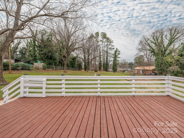 deck featuring a lawn