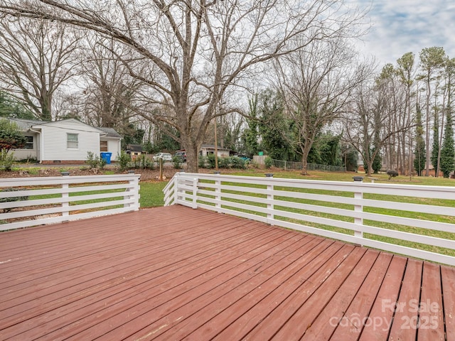 deck featuring a lawn