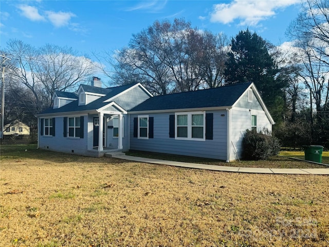 view of front of home with a front yard