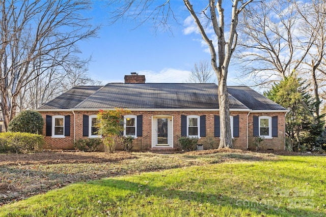 ranch-style home featuring a front yard