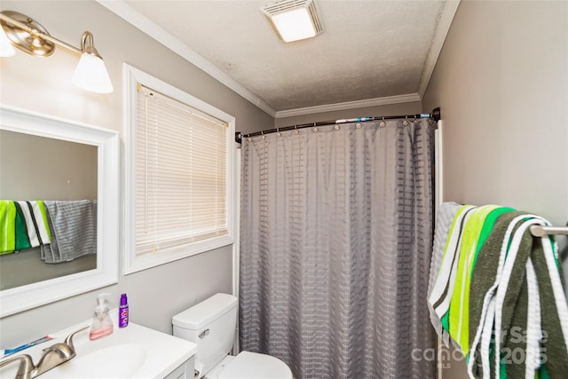 bathroom with crown molding, toilet, a textured ceiling, and vanity