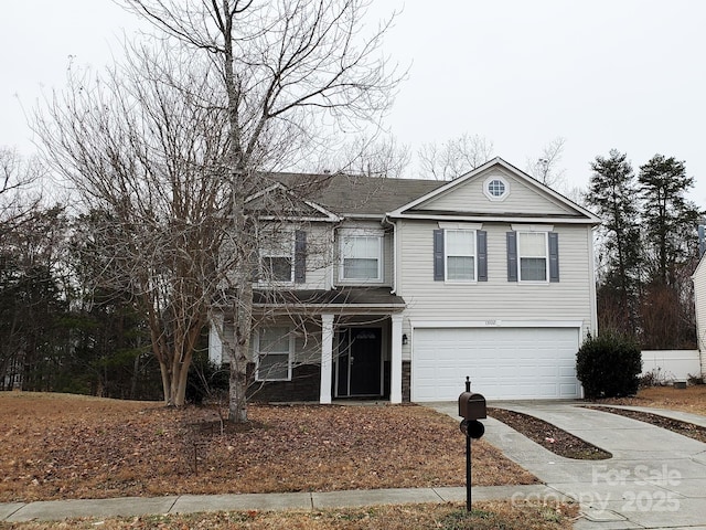 view of front property with a garage