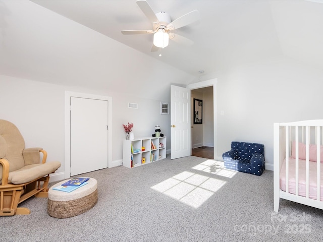 interior space featuring ceiling fan and vaulted ceiling