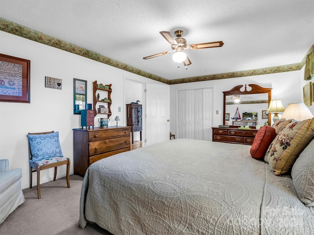 126 Cougar Rd, Casar, NC 28020 - bedroom featuring ceiling fan, a closet, carpet, and a textured ceiling