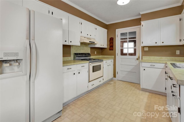 kitchen featuring tasteful backsplash, ornamental molding, white appliances, sink, and white cabinetry