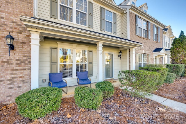 doorway to property featuring a porch