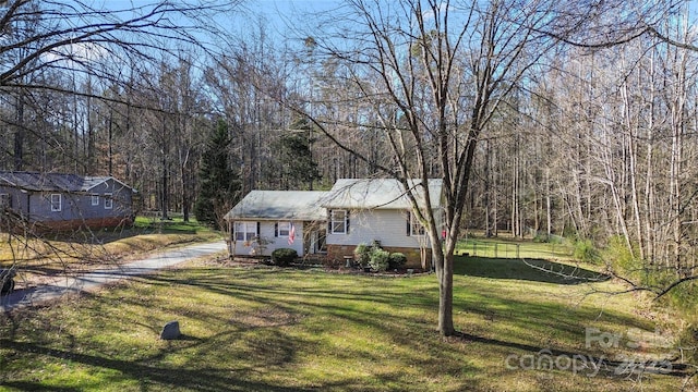 view of front of home with a front lawn