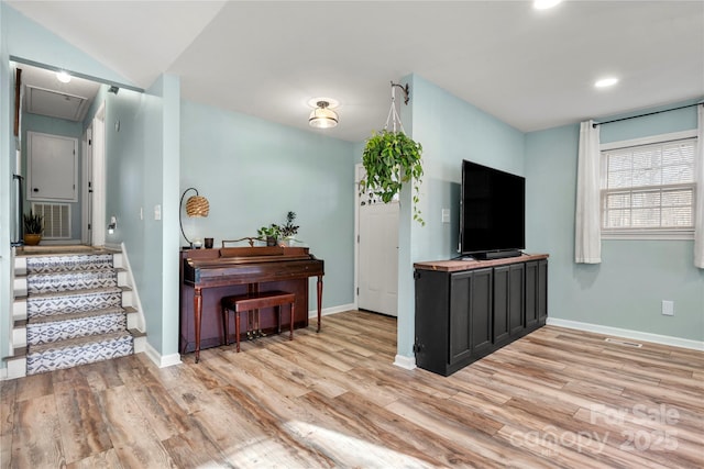 living room with light hardwood / wood-style floors