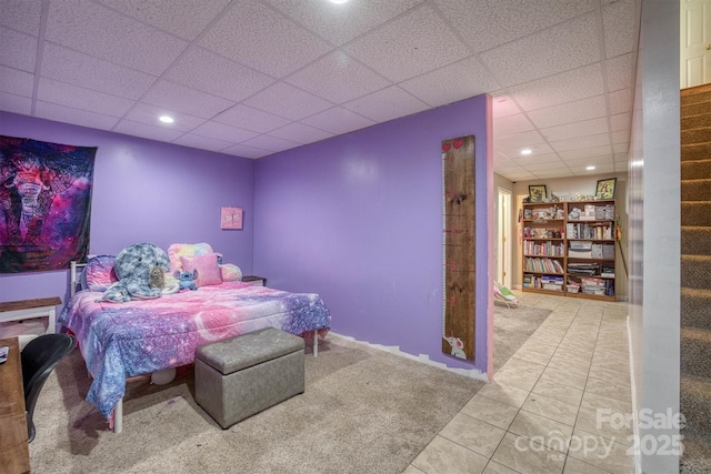 bedroom with light tile patterned floors