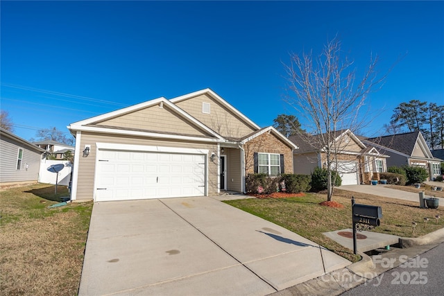 ranch-style house featuring a garage and a front lawn