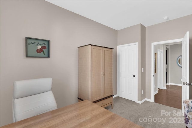 carpeted bedroom featuring a closet