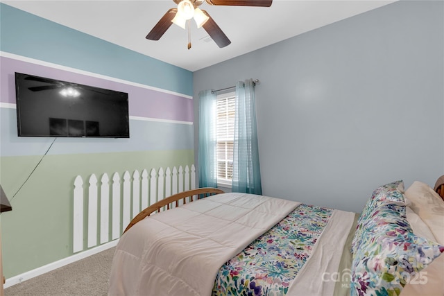 bedroom with ceiling fan and carpet floors