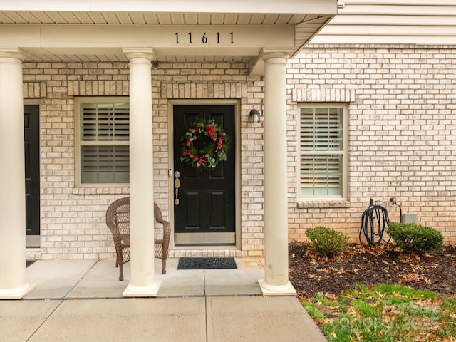 property entrance with a porch