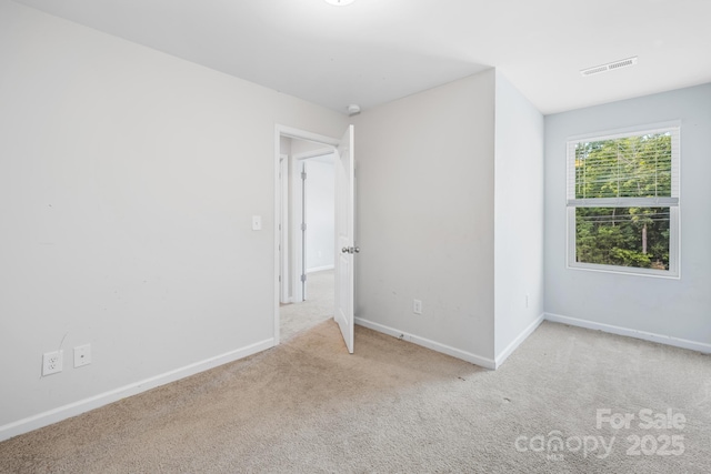 view of carpeted spare room