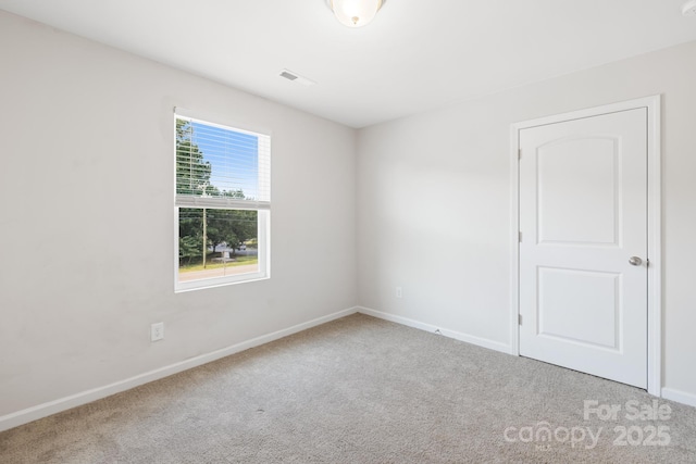 view of carpeted spare room