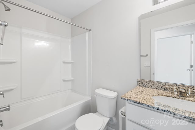 full bathroom with vanity, shower / bath combination, and toilet