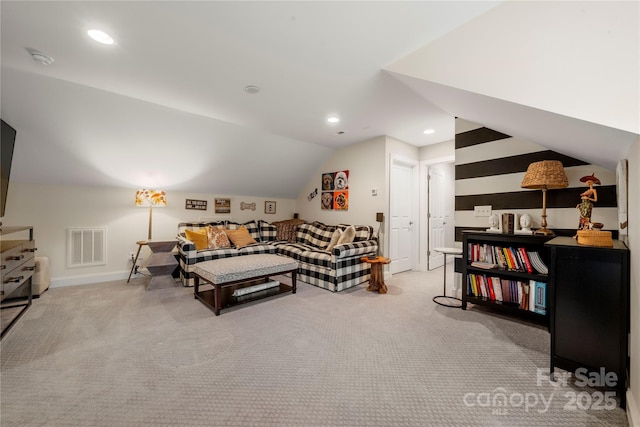 living room featuring light colored carpet and lofted ceiling