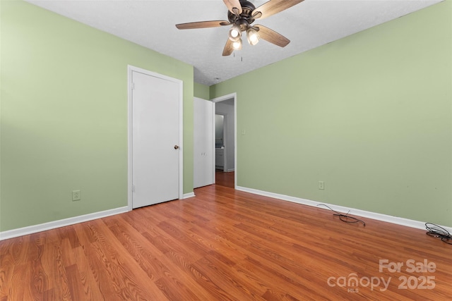 unfurnished bedroom with light hardwood / wood-style flooring and ceiling fan