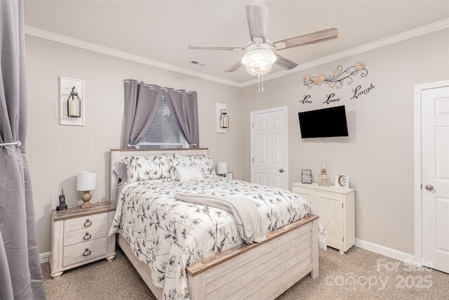 carpeted bedroom featuring ceiling fan and crown molding