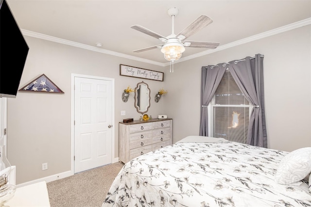 bedroom with ceiling fan, crown molding, and carpet flooring