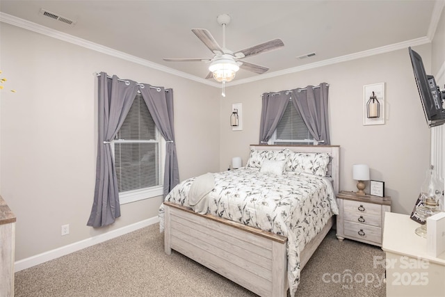 bedroom with ceiling fan, crown molding, and carpet flooring