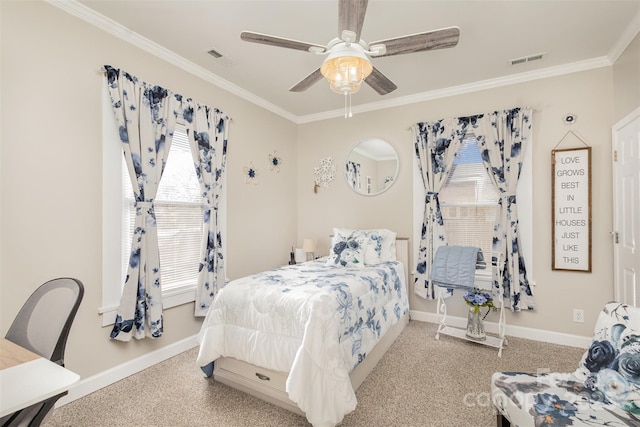 carpeted bedroom featuring ceiling fan, crown molding, and multiple windows