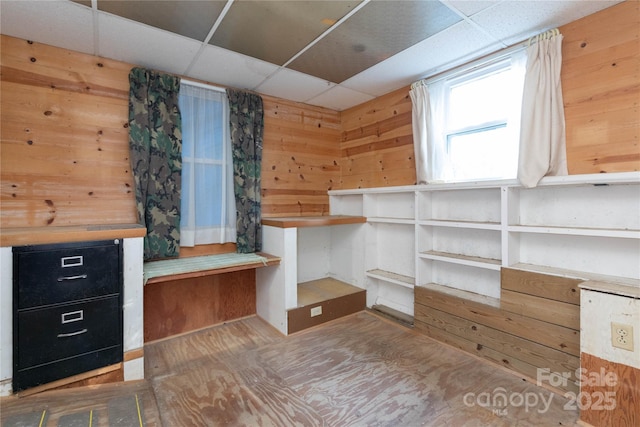 walk in closet with a paneled ceiling