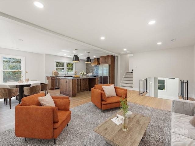 living room with light wood-type flooring