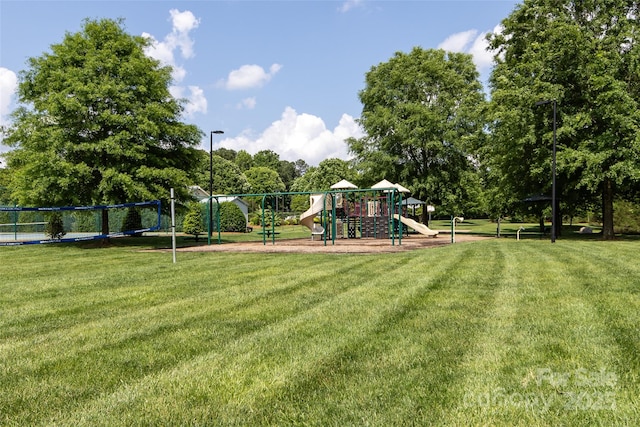 view of playground with a yard