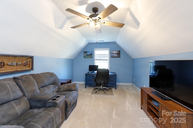 office area with light carpet, ceiling fan, and lofted ceiling