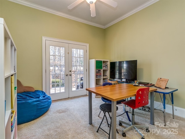 carpeted office space with french doors, ceiling fan, a wealth of natural light, and crown molding