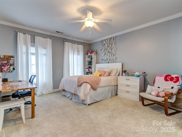 carpeted bedroom featuring ceiling fan and ornamental molding