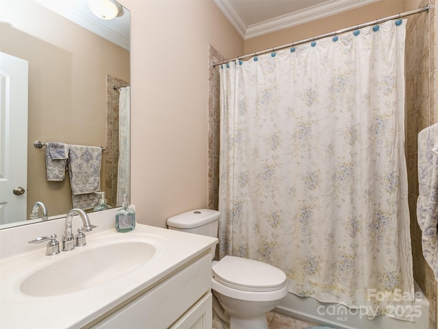 bathroom with toilet, ornamental molding, and vanity