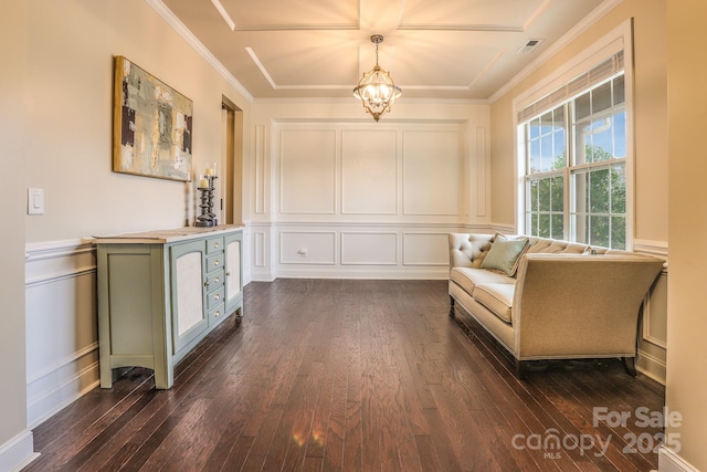 living area featuring crown molding, dark wood-style flooring, visible vents, and a decorative wall