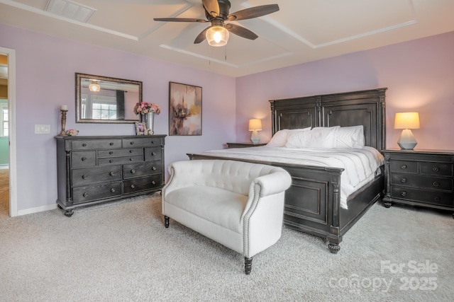 bedroom featuring light colored carpet, ceiling fan, visible vents, and baseboards