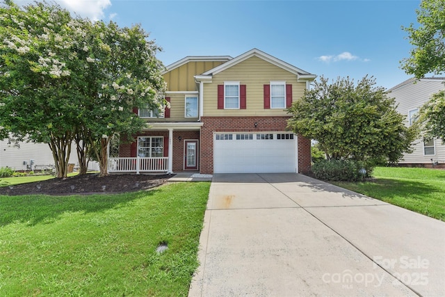 view of front of house featuring a front lawn, a porch, and a garage