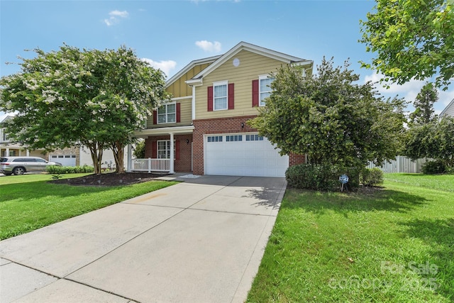 view of front facade with a front yard and a garage