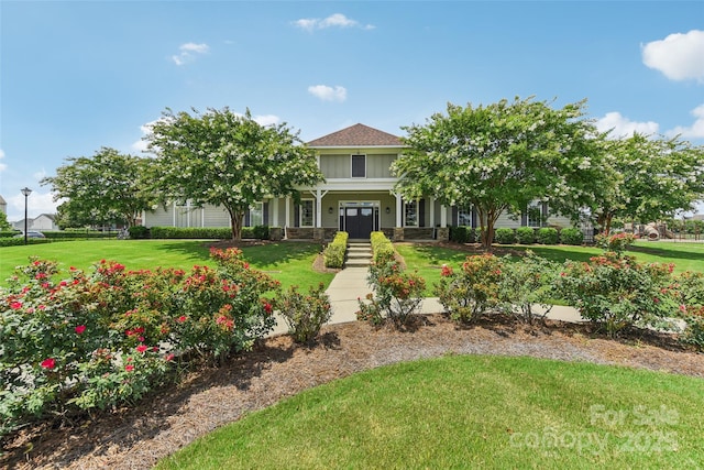 view of front of home with a front yard