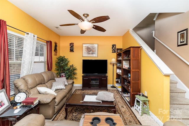 living room featuring ceiling fan