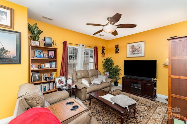 living room featuring ceiling fan