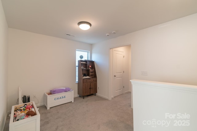 recreation room featuring visible vents and carpet flooring