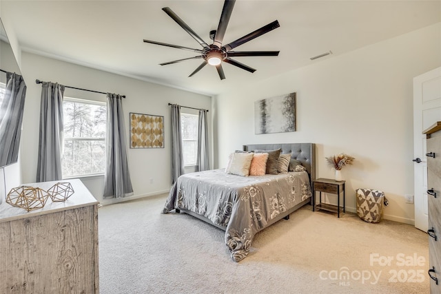 carpeted bedroom with ceiling fan