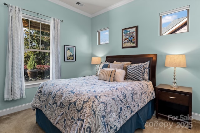 carpeted bedroom with crown molding