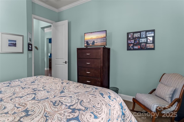 bedroom featuring crown molding