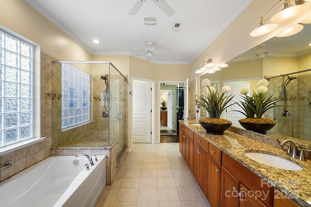 bathroom featuring tile patterned flooring, vanity, crown molding, and independent shower and bath