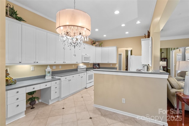 kitchen with white cabinets, pendant lighting, white appliances, and ornamental molding