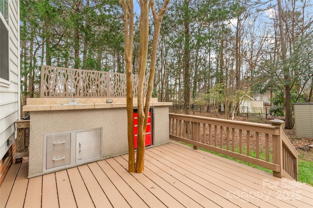 wooden deck with sink