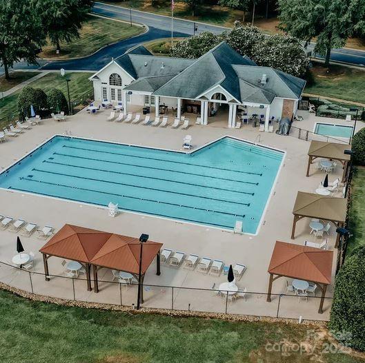 view of swimming pool featuring a gazebo and a patio