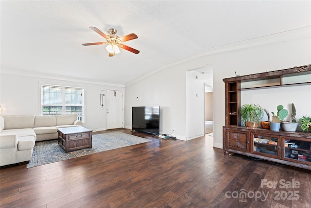 living room with a textured ceiling, ceiling fan, dark hardwood / wood-style floors, and vaulted ceiling